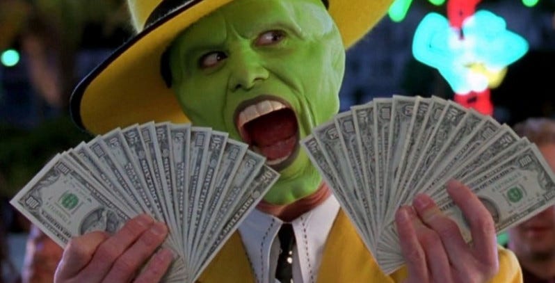 Jim Carrey as the Mask holding lots of money and looking excited