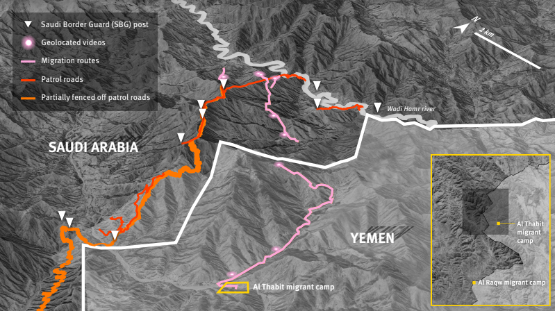 A map of the border between Saudi Arabia (left) and Yemen (right) in black and white with two foot routes commonly taken by migrants highlighted in orange and pink.