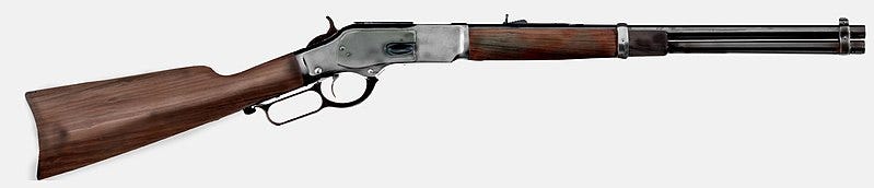 Photo of a Winchester model 1873 lever action rifle.