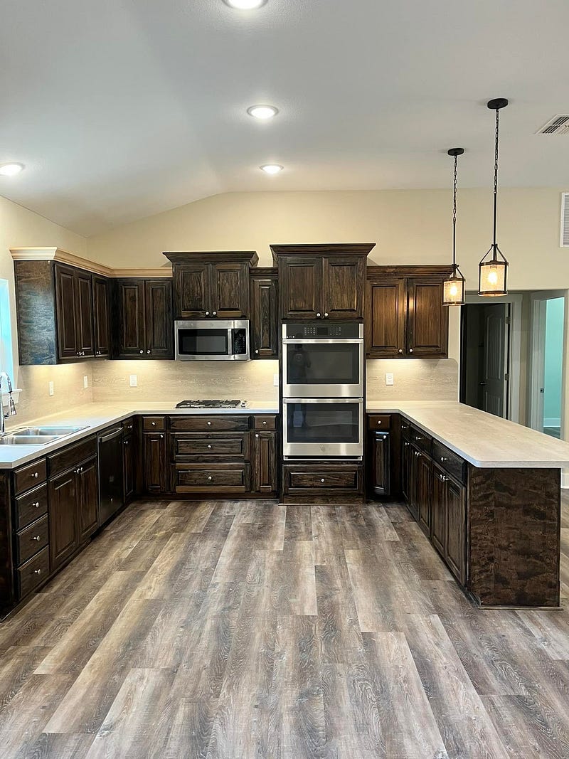 Kitchen of Texas Barndominium by Mr. Space Makers LLC 
