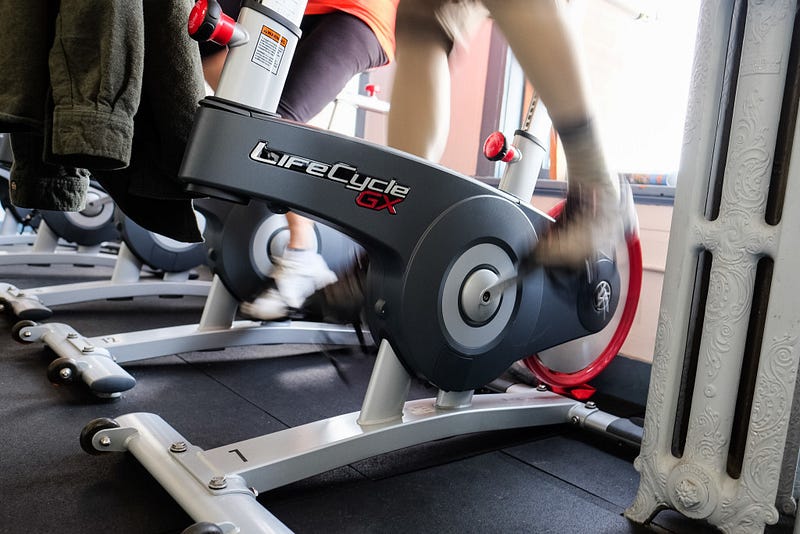 The Pedaling for Parkinson’s class consists of a 10-minute warm up, followed by a 40-minute session keeping the bike at 80-90 rpm and ending with a 10-minute cool down. Hermann, 65, who was diagnosed with Parkinson’s disease in 1998, attends all three days the class meets each week.