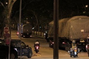In the early morning of June 12, the defective trains are transported out of SMRT's Bishan Depot. (Photo: FactWire)