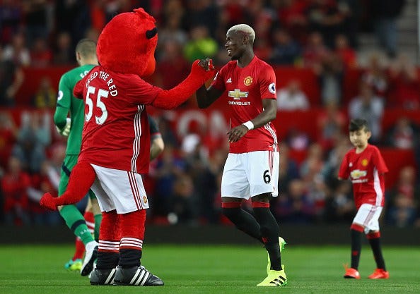 Pogba with mascot Getty