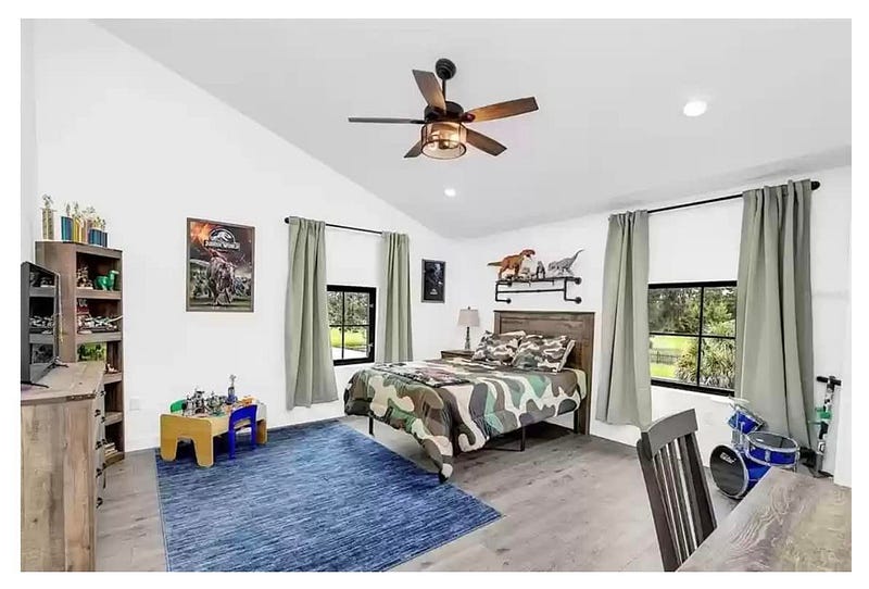 Bedroom of Osceola County, Florida Barndominium by Leslie Mintrone 
