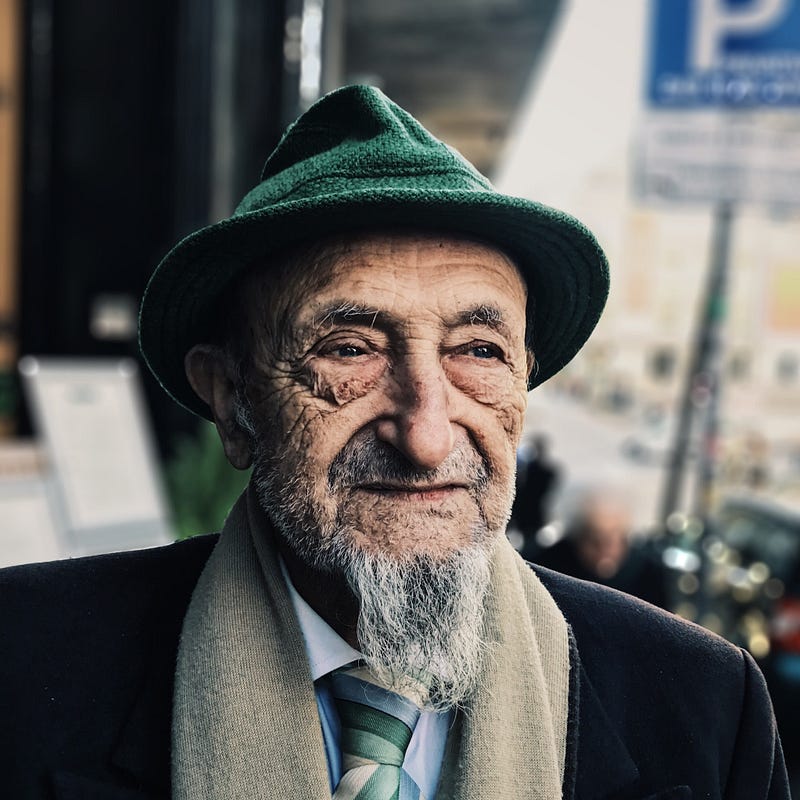 Well-dressed elderly gentleman looking wise