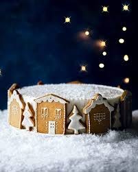 A white base theme with a design of a house in winter season covered with snow.