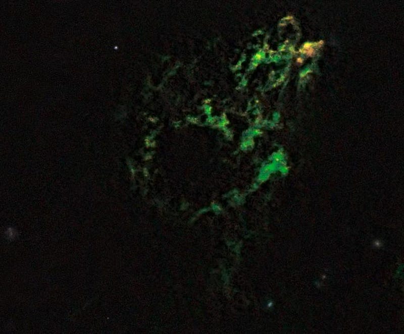 This Is Why Some Galaxies Have A Green Glow Even Though There Are No
