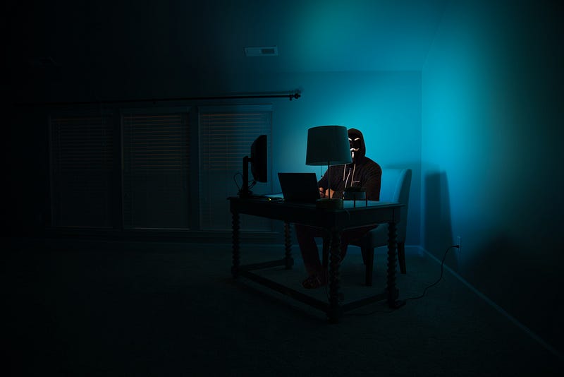 Hacker in a dark room