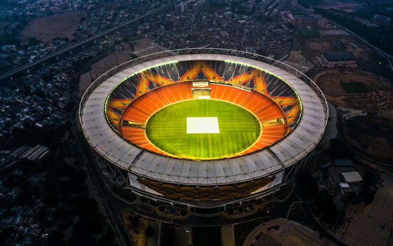 The image shows a big circular stadium called Narendra Modi Stadium at heart of Ahmedabad, Gujarat in India.