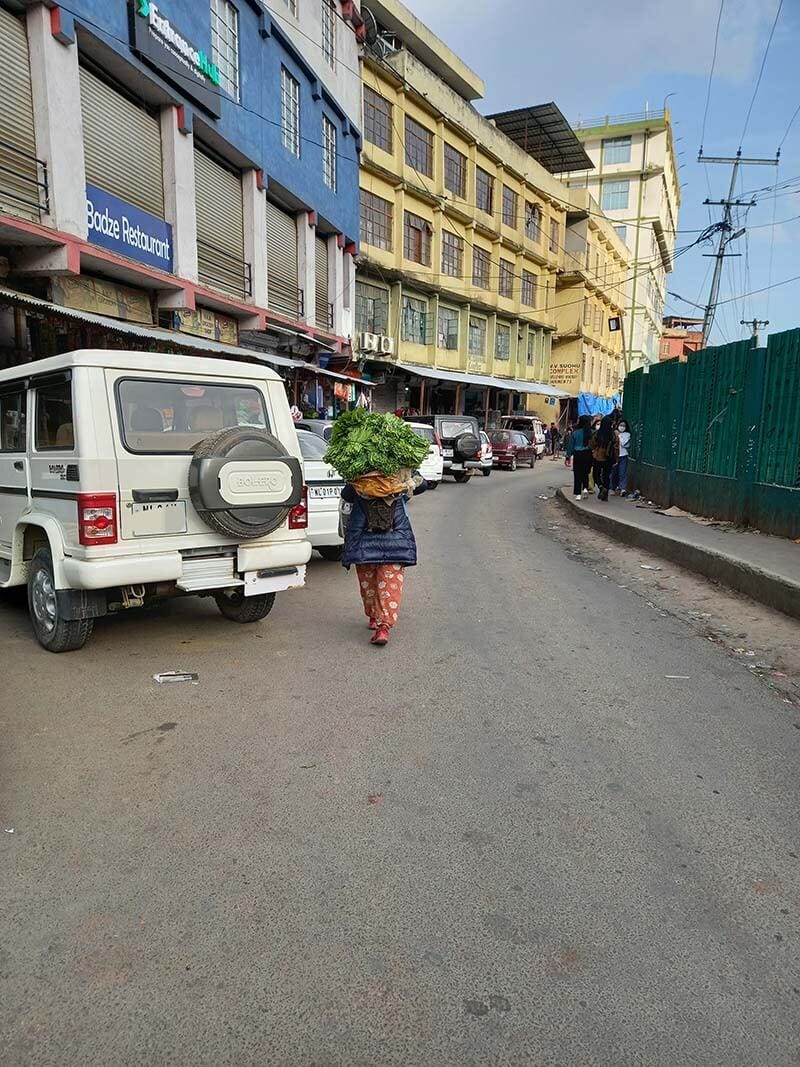 An elderly Naga woman on her way to the local market.