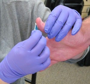 A gunshot residue (GSR) test being performed.
