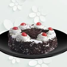 Brown and white beautiful icings decorations with big reg cherries