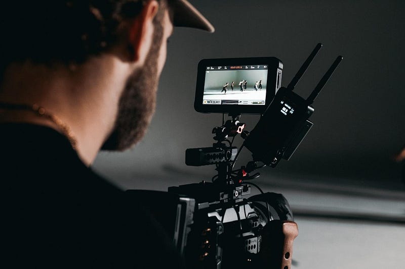 A person filming content as part of a digital marketing strategy