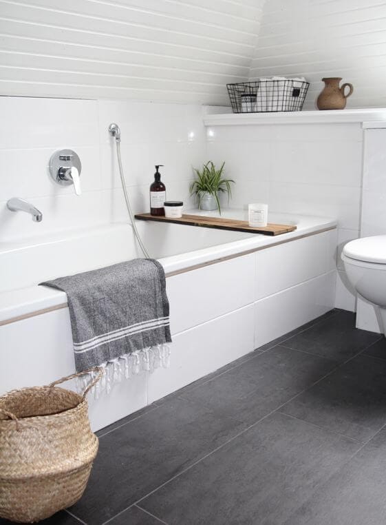 Scandinavian bathroom with grey tiled floor