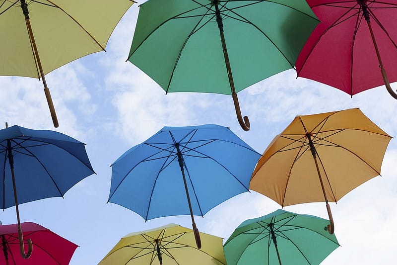Photo of multicolors umbrellas. Photo for business concepts, financial concepts, security concepts and many other.