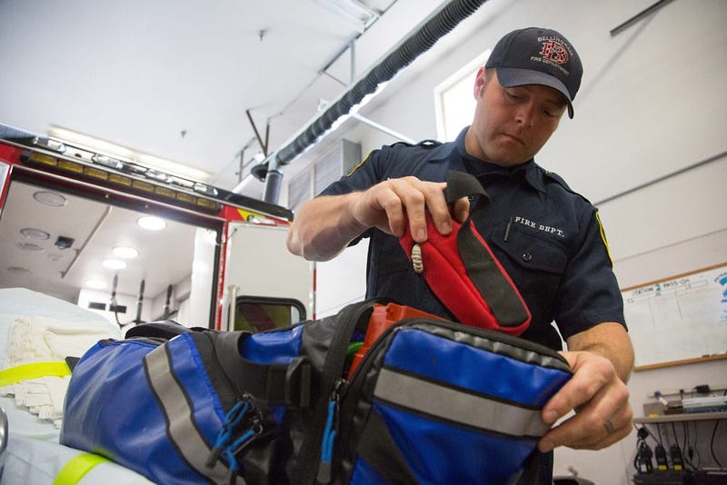 McDonald rummages through a Basic Life Support pack as he starts his 24-hour shift at Bellingham Fire Station 2 on Tuesday, April 26. At the start of every shift, firefighters go through checks on all of their equipment and vehicles to make sure all necessary supplies and tools are up to date and where they belong. This bag contains everything from a tourniquet to clotting agents for gunshot and stab wounds to Narcan, an opiate antidote commonly used to treat heroine overdoses.