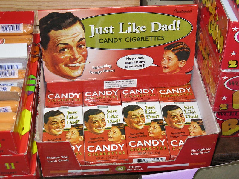 Advertisement for candy cigarettes “Just Like Dad!”