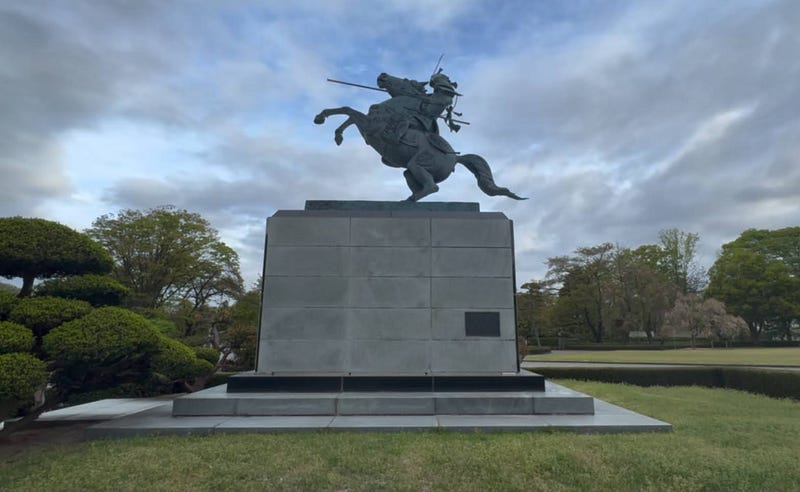 A statue of Mogami Yoshiaki on his horse in Kajo Park, the remains of Yamagata Castle