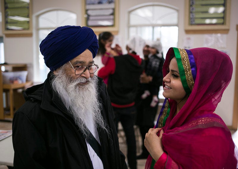 Sukhmanii Kahlon talking with Gurbaksh Singh