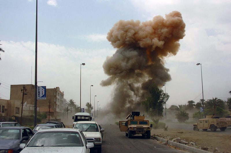 As Coalition Forces respond to a car bombing in South Baghdad, Iraq (IRQ), a second car bomb is detonated, targeting those responding to the initial incident. The attack, aimed at the Iraqi police force, resulted in 18 casualties, two of which were police officers, during Operation IRAQI FREEDOM.