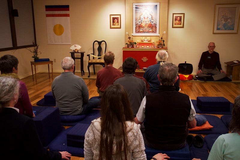 Members meditate peacefully at the Shambhala mediation center of Bellingham in a session led by (John’s main source for the centers name, Robin Rieck. 