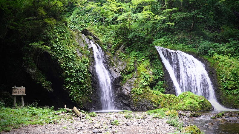 Two spouts of Juninotaki Falls ‘The Twelve Falls’ at the base of Mt. Kyogakura, one of the 100 Famous Mountains of Yamagata located in Sakata City, in the Tohoku region of North Japan.