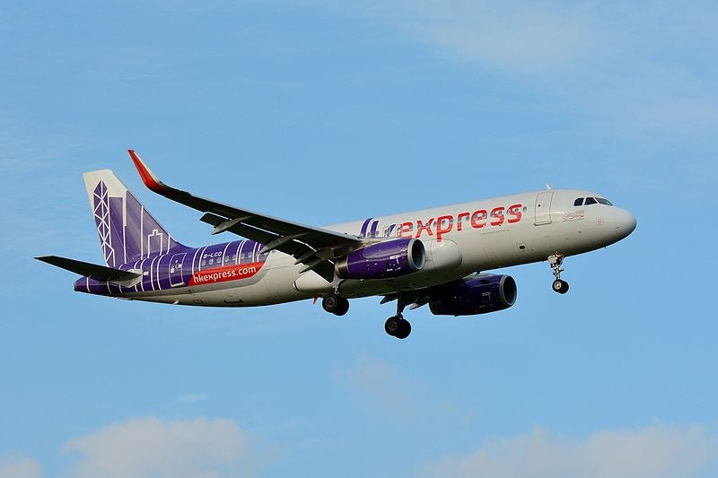 illustration of a cargo plane with an"air india express" logo written on it