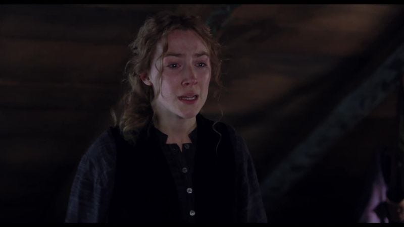 An image shows Saoirse Ronan as Jo March from Little Women delivering her famous dialogue. She seems sad and teary eyed. She wears a blue shirt with a blue pullover.
