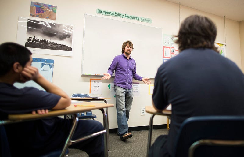 Matthew Brouwer, co-founder of the Whatcom Juvenile Justice Creative Writing Project, begins a class consisting of four male inmates on May 20, 2015.