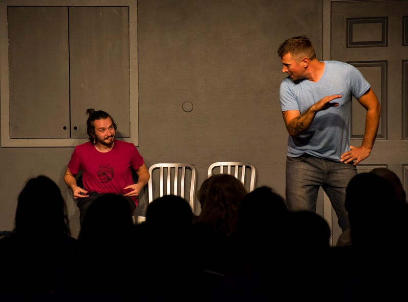 Jacob Foerg (left) and Yonk Reinemer (right) act out a scene about deserts, Harry Potter and mermaids at The Upfront Theatre.