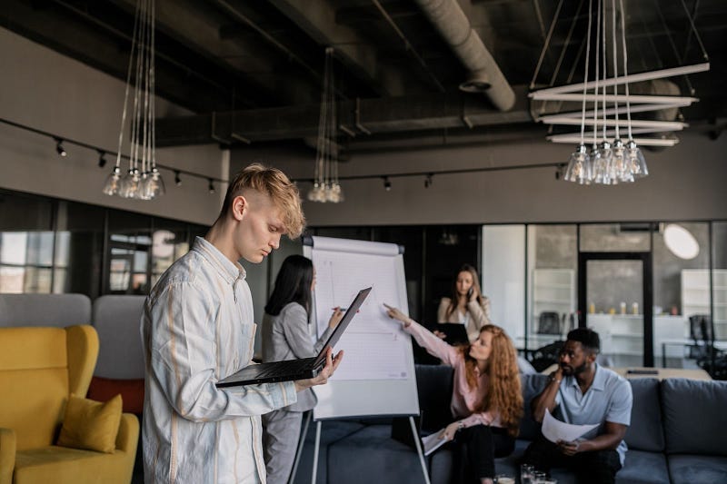 A team using a Gantt chart to improve project management