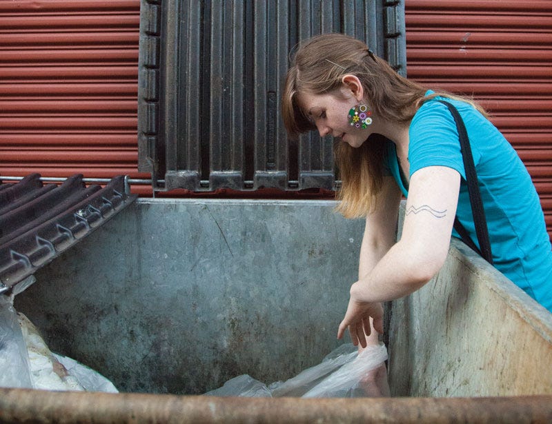 Girl dumpster diving