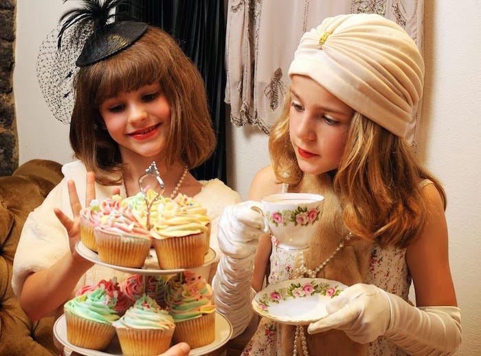 Girls tea party with cupcakes