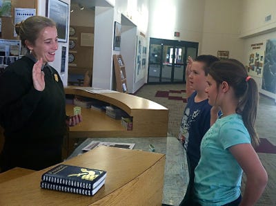 Perry kids taking the Junior Ranger Pledge.