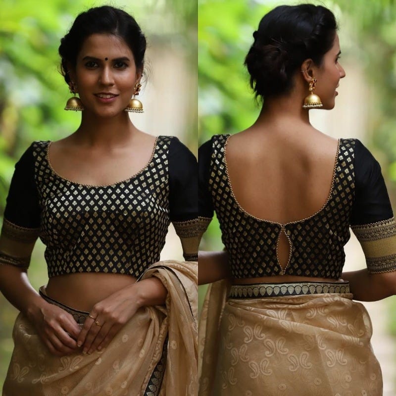 black brocade blouse to spice up our traditional sarees.