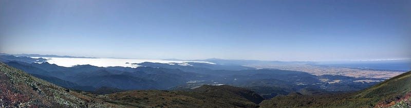 A panorama from Chokai-san (Mt. Chokai) with Unkai (sea of clouds) over inland Yamagata, Gassan in the centre, and the Shonai plains and Sea of Japan to the right.