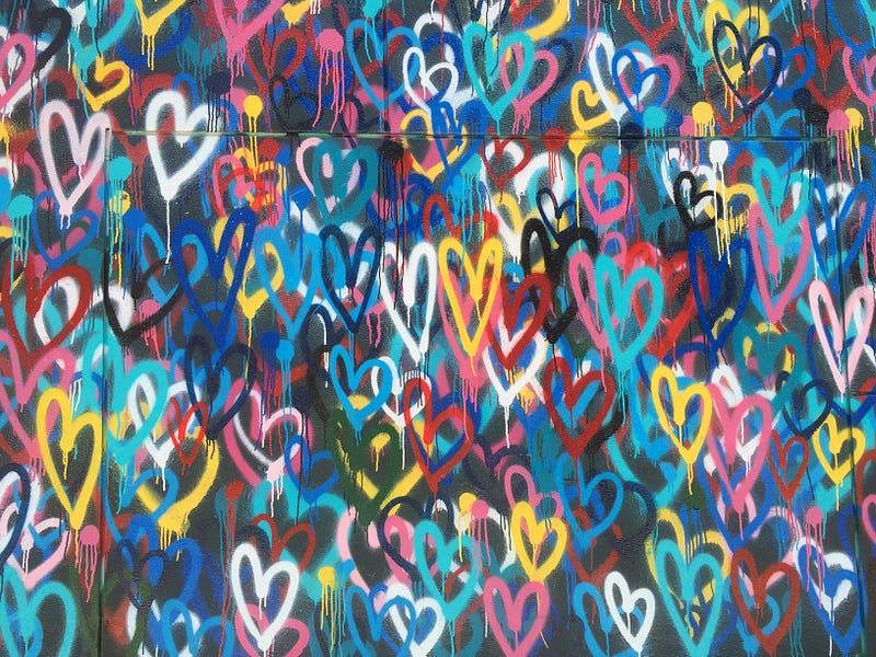 Multi-colored spray painted hearts