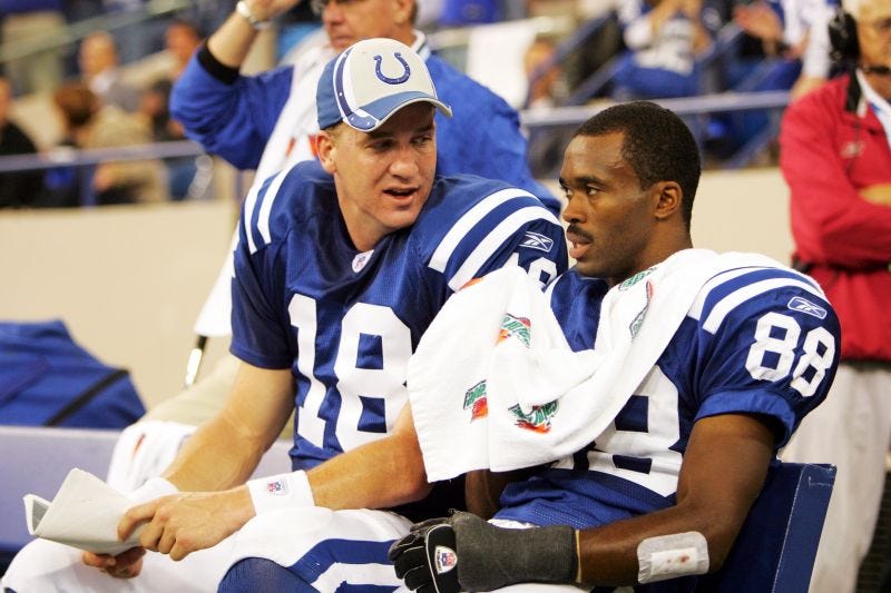 Peyton Manning (left) and longtime teammate Marvin Harrison.