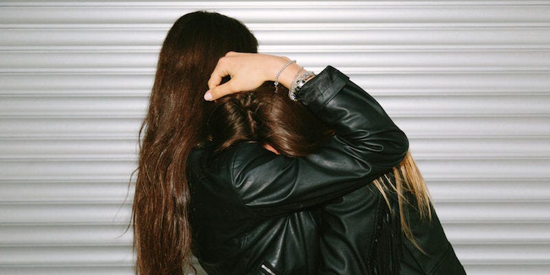 elitedaily-giorgio-fochesato-woman-hugging