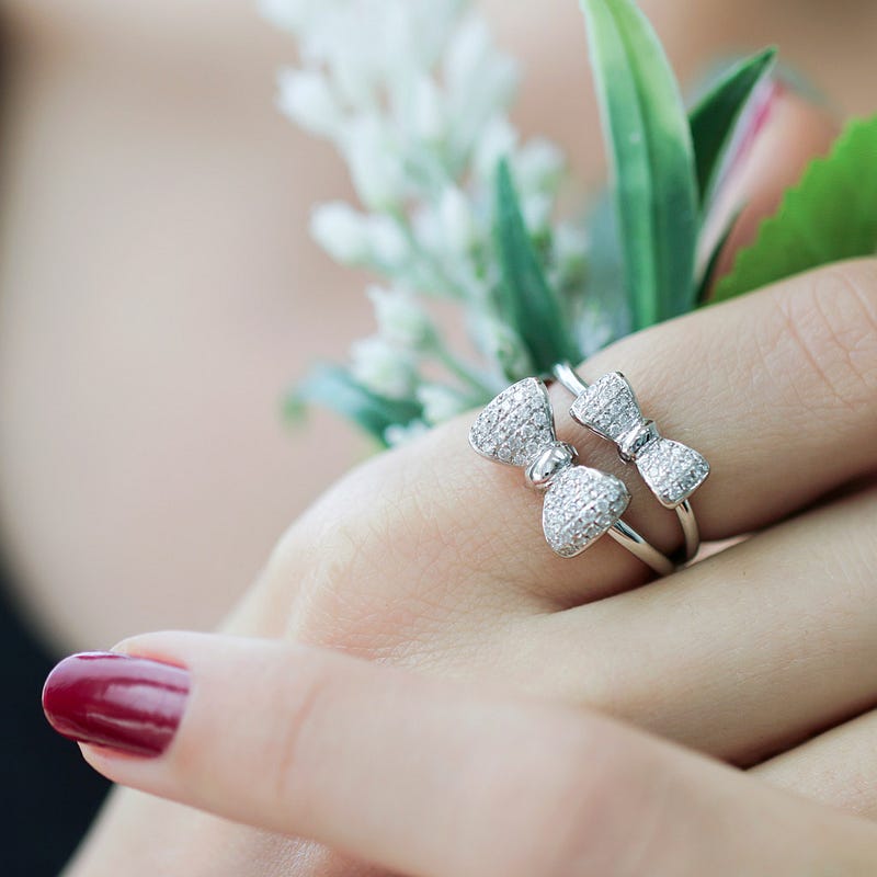 two-tier-diamond-bow-ring-plukka