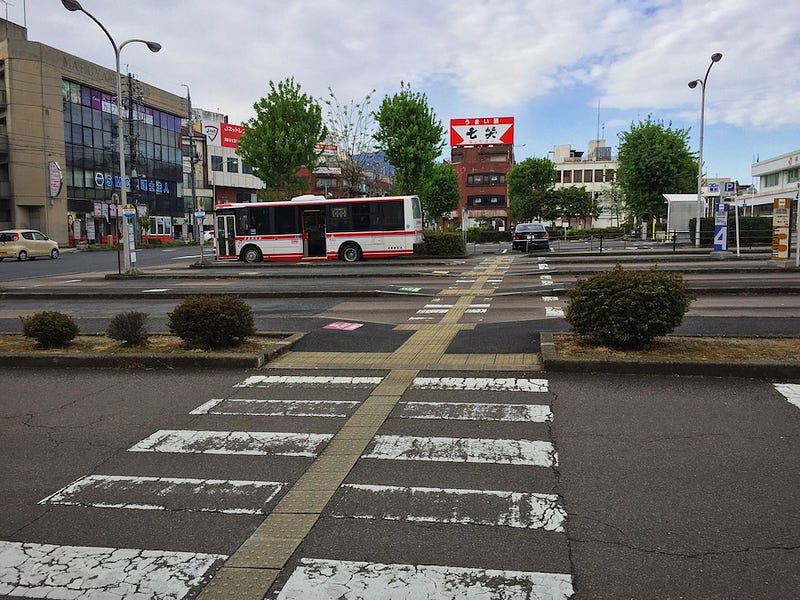 The bus station area in front of Nakatsugawa Station in the Kiso Valley