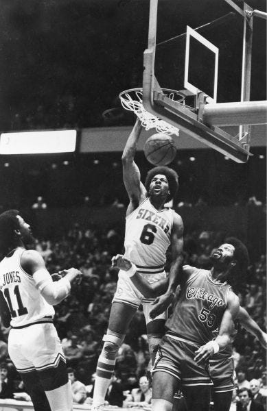 Julius Erving dunks during the 1977 NBA All-Star Game.