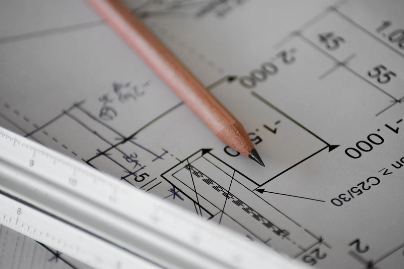 Pencil and paper showing dimensions for construction