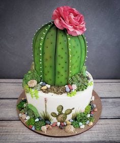 A green cactus shaped Christ Birthday Xmas cake