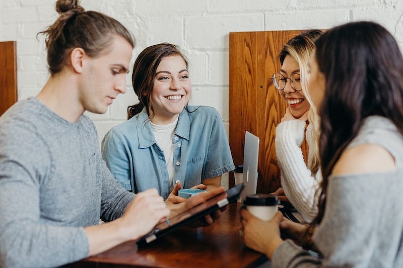 Colleagues smiling in meeting