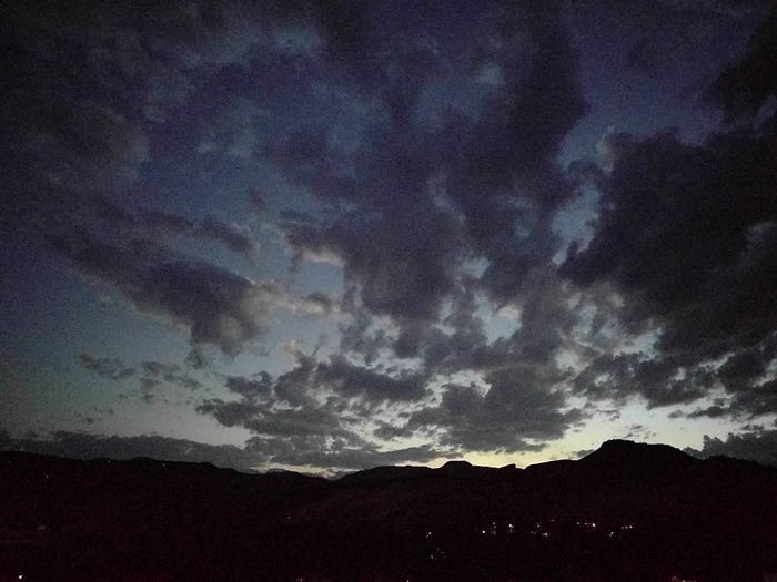 Photo of dark clouds at sunset