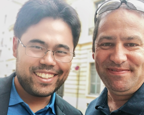Chess grandmaster Hikaru Nakamura and chess fan Shahar Tzafrir at a Paris chess event. 2016.