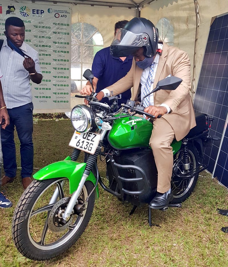 The Lord Mayor Erias Lukwago giving it a go.