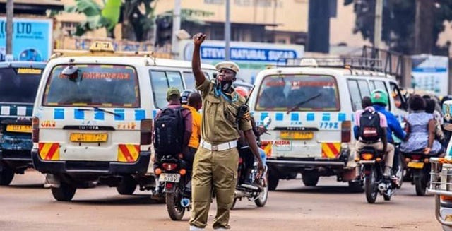 Traffic police taking over for street lights. Credit: The Independent.