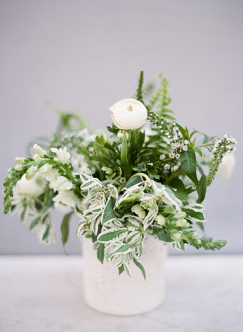 green and white flowers - http://ruffledblog.com/downtown-dallas-rehearsal-dinner-inspiration